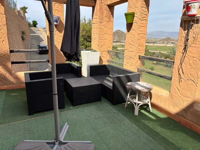 Terraza con vistas al campo de golf